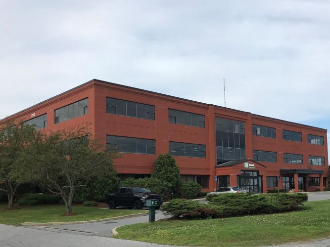 Dealer Policy Office Renovation by Wright & Morrissey, Inc. in