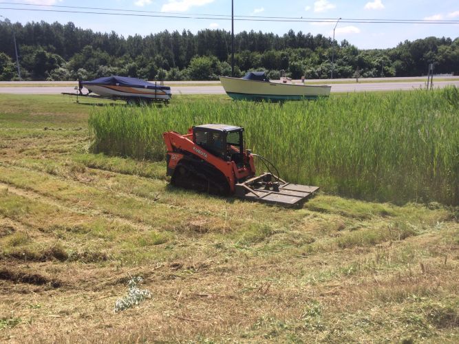 Driveway with Blacktop Millings by Southside Land Management in