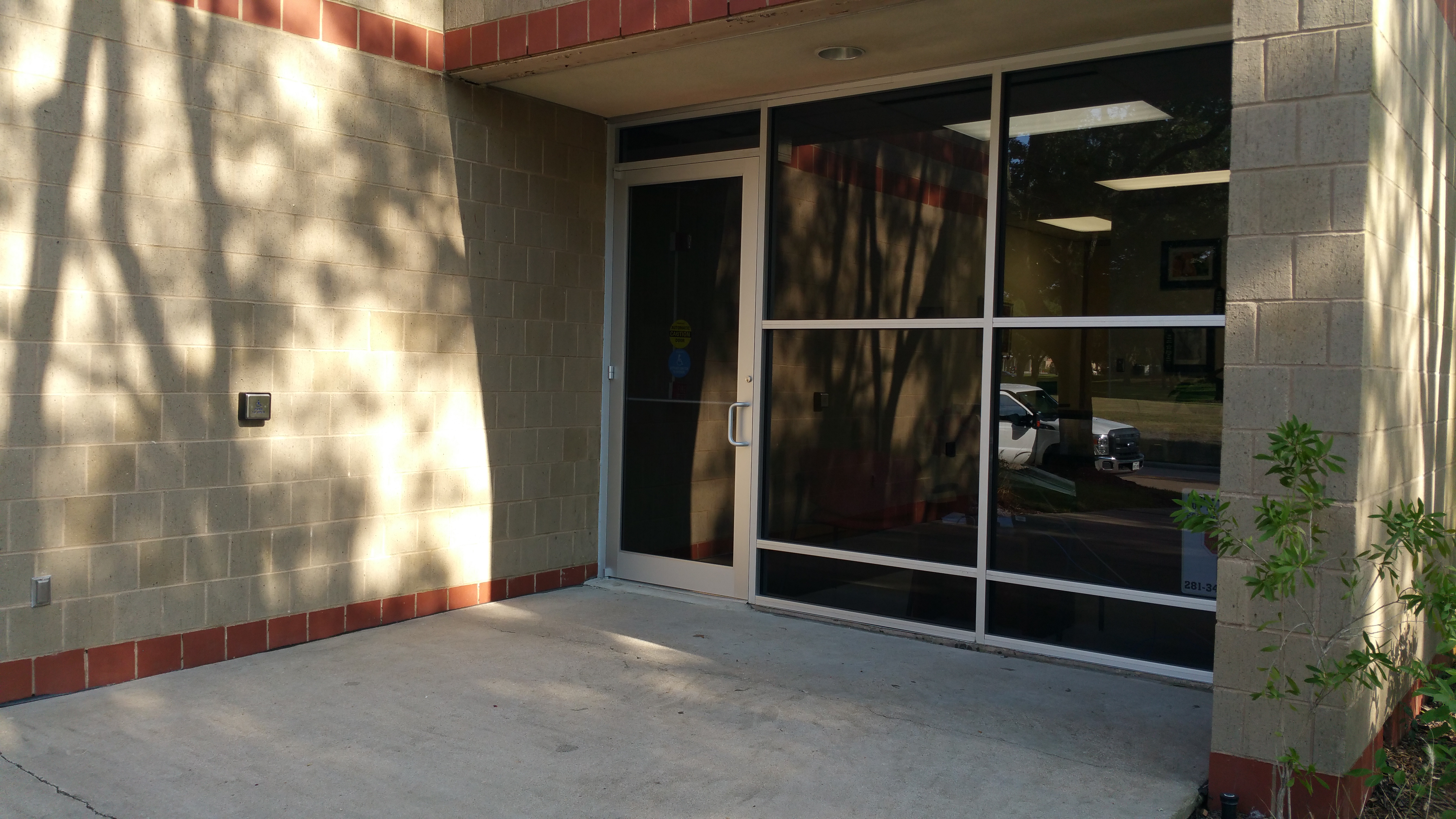 Side view of new storefront w/automatic