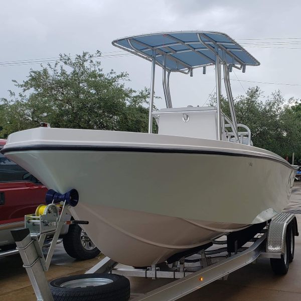 New paint, rub rail, custom T top, and more to come. 