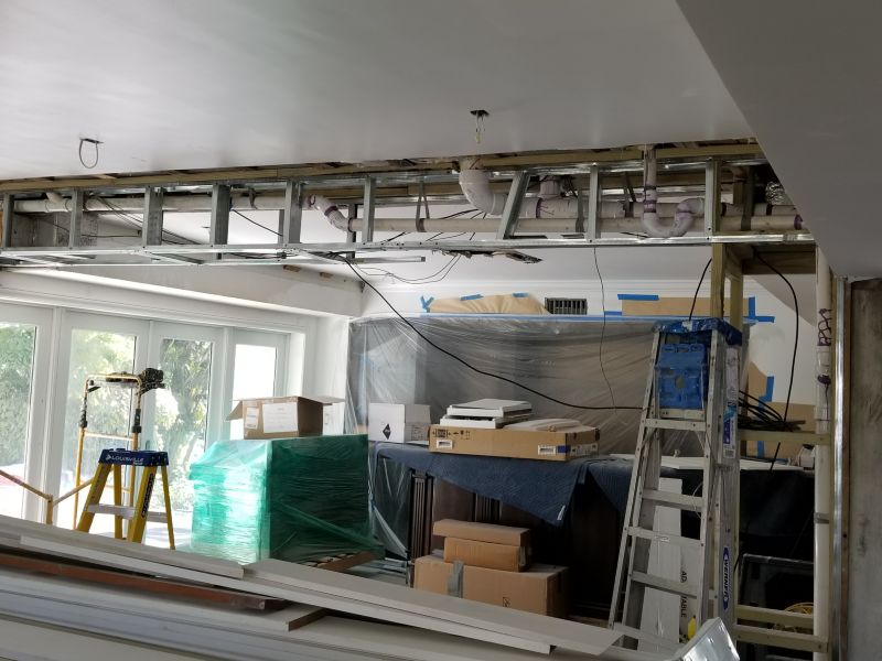 Finally no pipe separating the sitting room and bar! No more column!