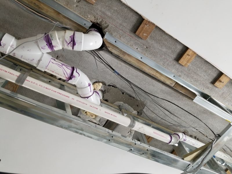 New redirected upstairs bathroom pipe. 