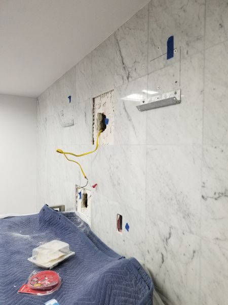 New tile and about to hang a custom led lit mirror. 