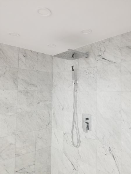 New marble shower and fixture.