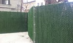 CHAIN LINK WITH GREEN GRASS