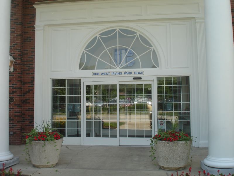 Automatic sliding doors with french window glazing 