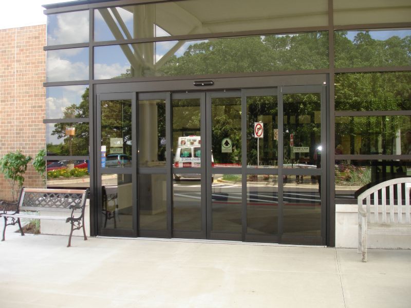 Automatic telescoping sliding doors
