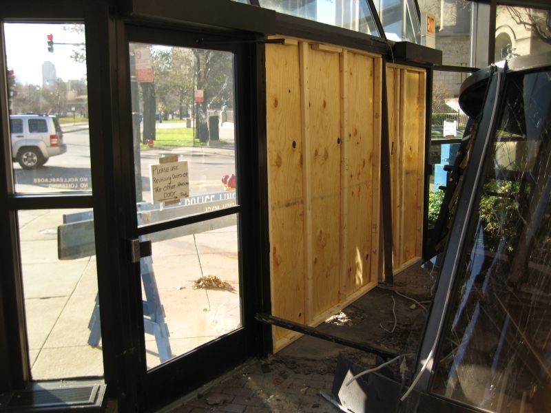 Car jumps curb and runs through entryway
