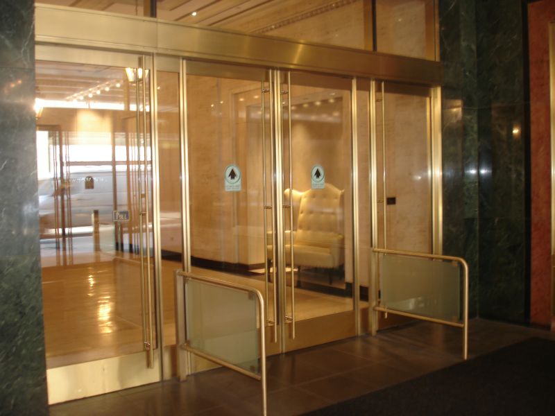 Custom bronze extruded automatic swing doors 