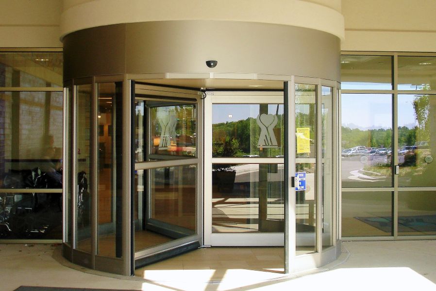 Large diameter automatic revolving doors for medical office buildings