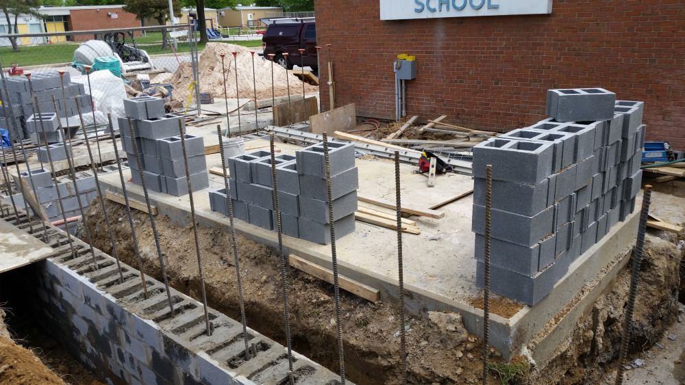 Masonry enclosure in progress