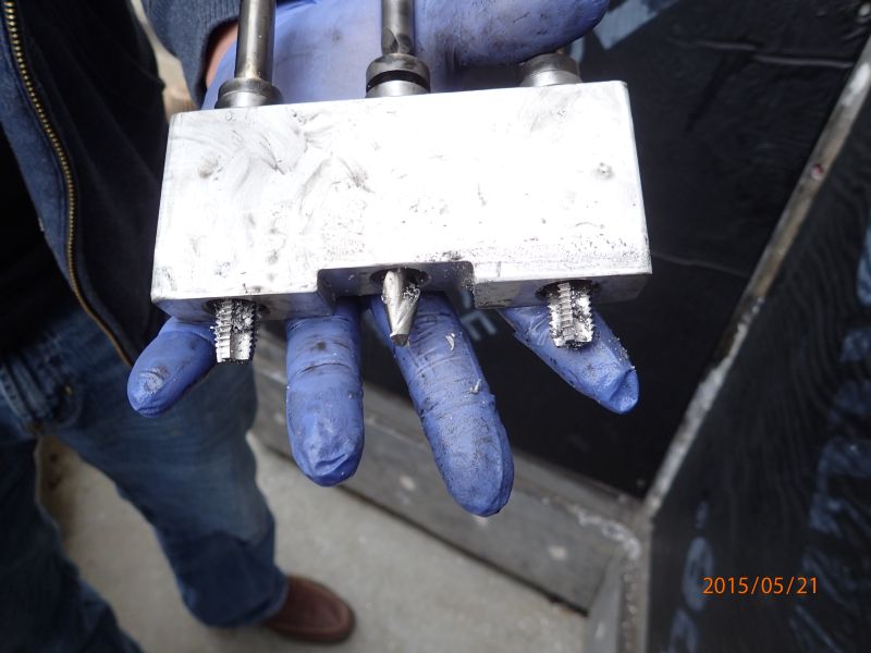 Empire State Building New York, NY - Desinged and fabricated screw removal and threading of new fasteners for the installation of new curtain wall glass on the mooring mast