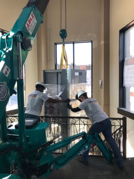 Switch Gear being lowered into the vault